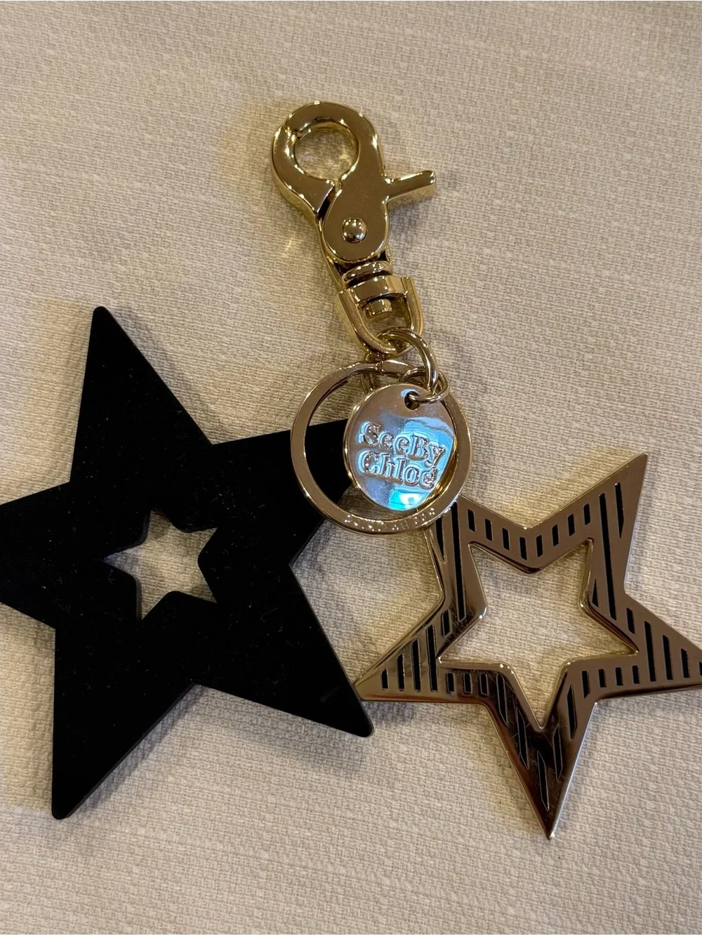 See By Chloe Black and Gold Star Keychain Bag Charm